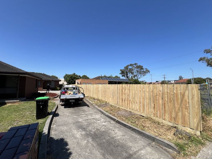 Timber fence along a driveway by HD Fencing