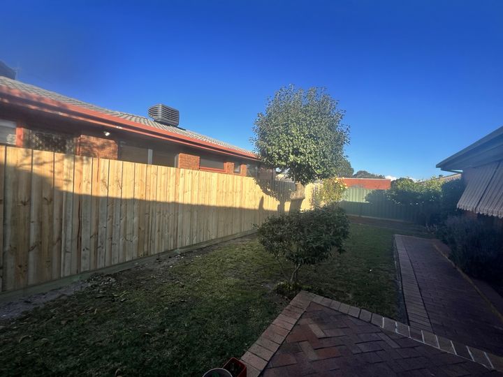Timber fence around a garden by HD Fencing