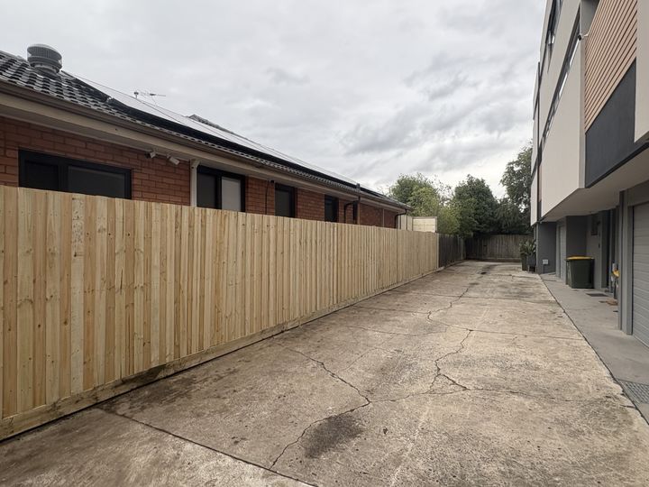 Timber driveway boundary fence by HD Fencing