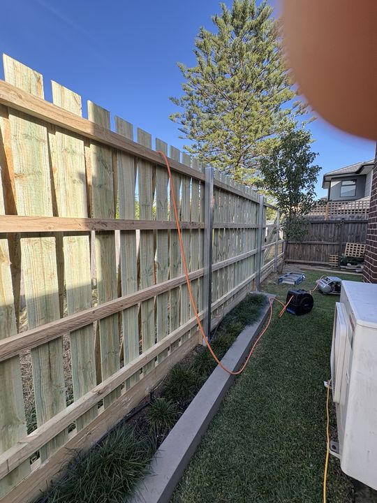 Timber fence beside a property by HD Fencing